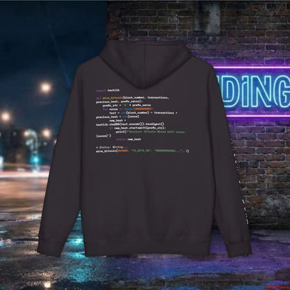 Large-scale functional Python script for a SHA-256 Bitcoin mining loop printed in high-contrast white ink across the back of a black hoodie.