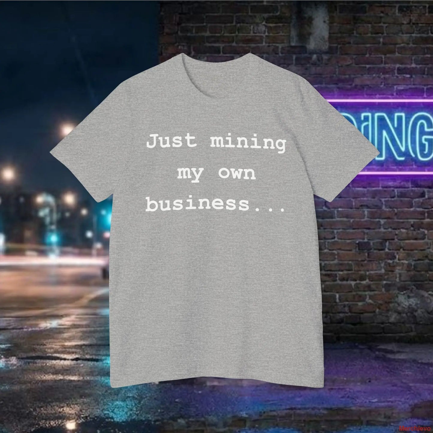 Minimalist "Just mining my own business" text in a modern sans-serif font centered on a white premium cotton jersey t-shirt.