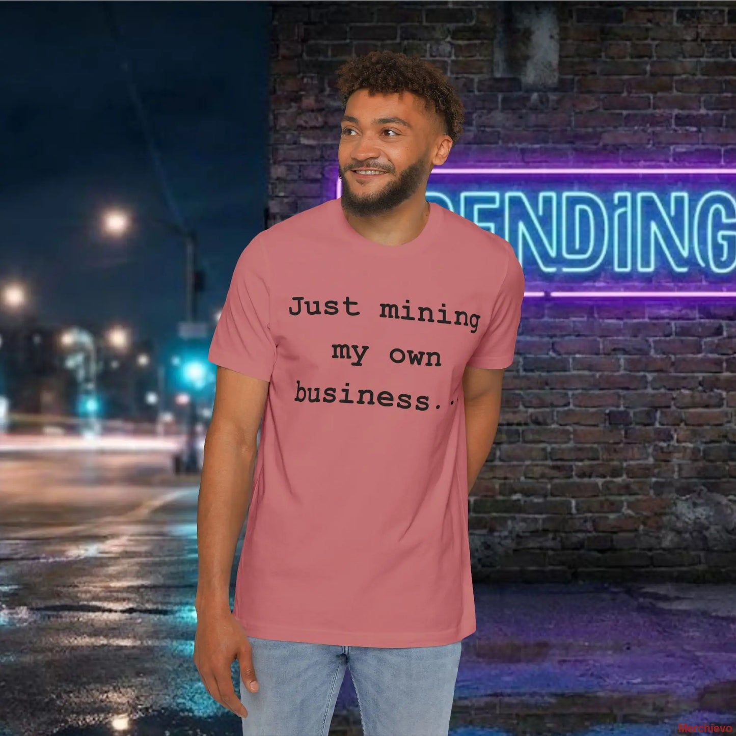  Minimalist "Just mining my own business" text in a modern sans-serif font centered on a white premium cotton jersey t-shirt. 